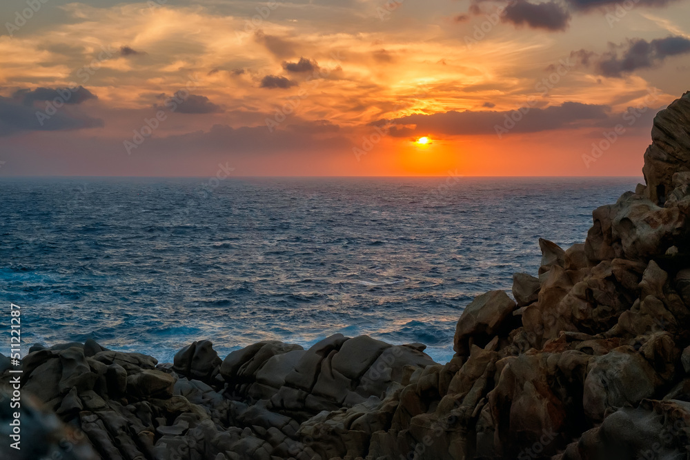 Panoramic landscape view with dramatic sunset on rocky coast, Santa teresa di Gallura, sunset at Capo Testa, Sardinia Panoramic landscape view with dramatic sunset on rocky coast, Santa teresa di Gallura, sunset at Capo Testa, Sardinia