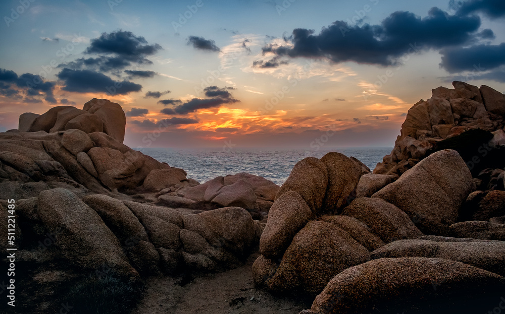 Panoramic landscape view with dramatic sunset on rocky coast, Santa teresa di Gallura, sunset at Capo Testa, Sardinia Panoramic landscape view with dramatic sunset on rocky coast, Santa teresa di Gallura, sunset at Capo Testa, Sardinia