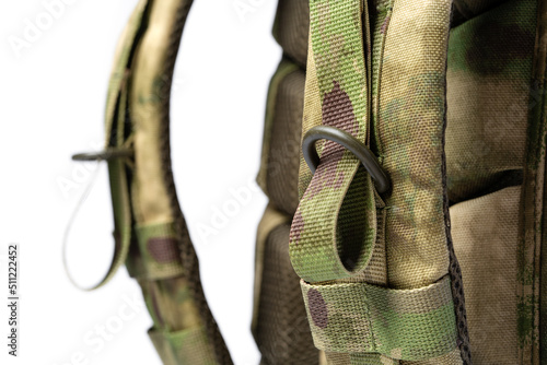 Close up still life of a green army tactical backpack