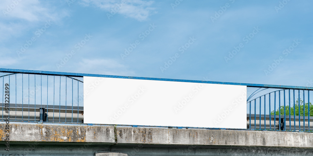 Empty white poster with mock up space fixed on rusty bridge banister outdoor Empty white poster with mock up space fixed on rusty bridge banister outdoor