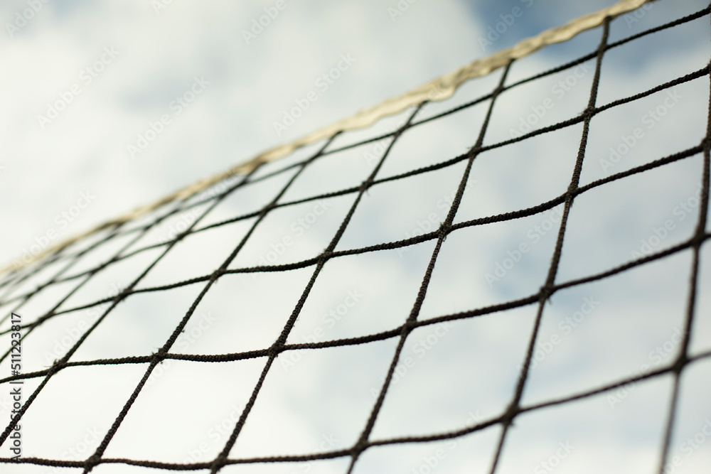 Sports net. Volleyball equipment. Grid against sky. Sports net. Volleyball equipment. Grid against sky.