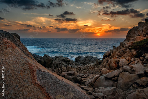 Panoramic landscape view with dramatic sunset on rocky coast, Santa teresa di Gallura, sunset at Capo Testa, Sardinia photo