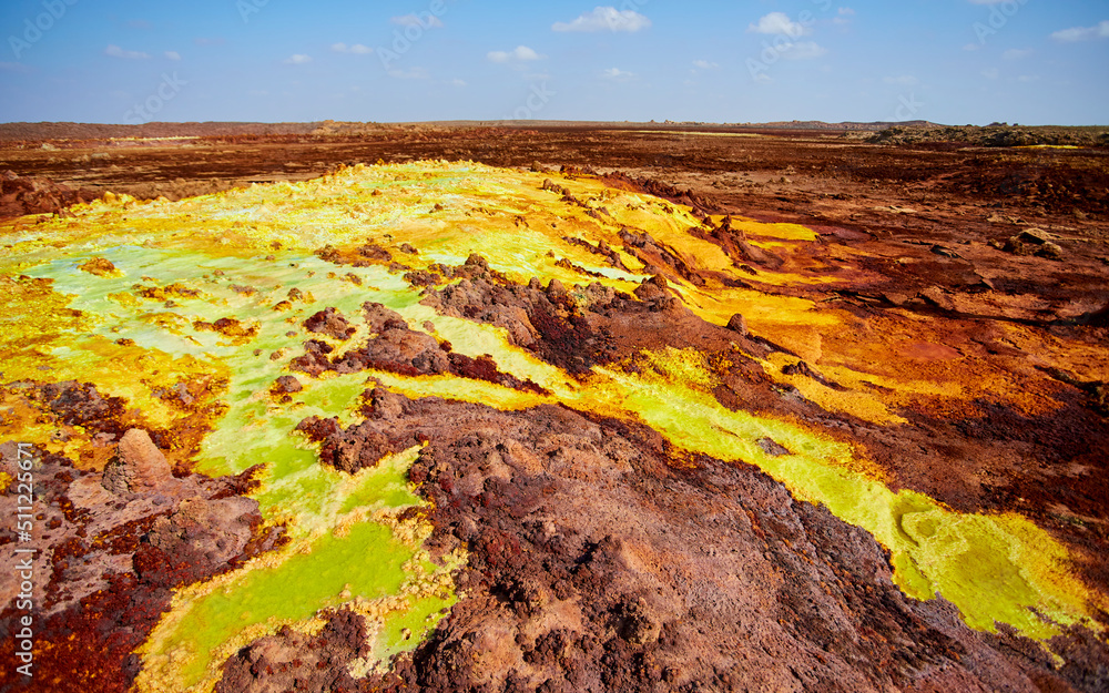 Multicolored pools of iron oxides erupting from the depths of the ...