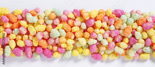 Fotografija Rainbow colored puffed maize