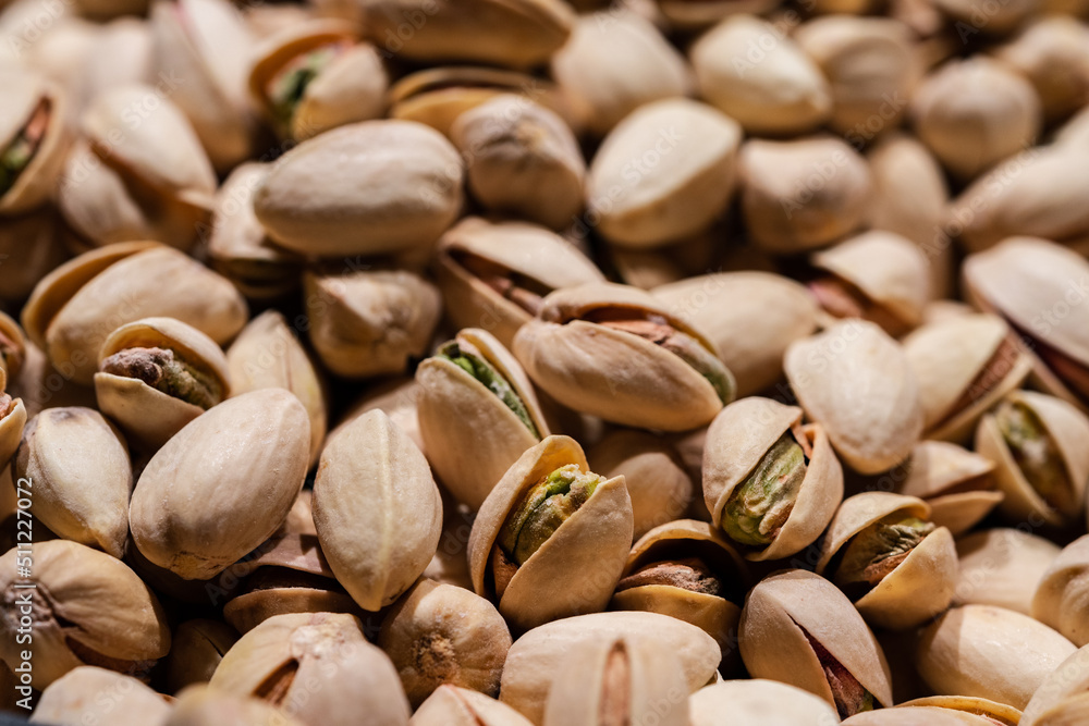 Pistachios nuts texture and background, close up
