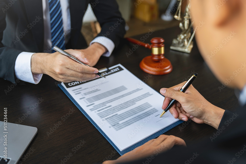 Lawyer or judge advising client's trial at attorney's office