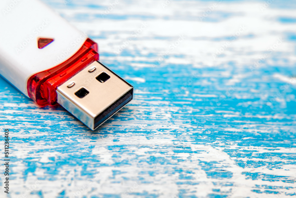 Fototapeta premium USB flash card with white color close-up 