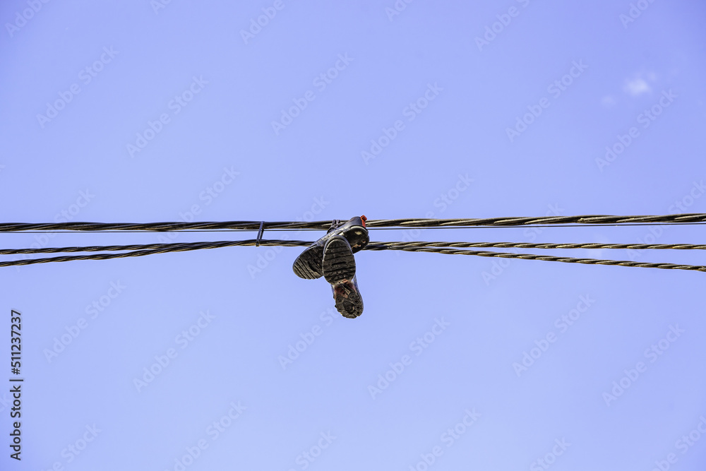 Slippers on electrical wires Slippers on electrical wires