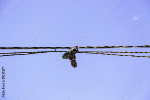 Slippers on electrical wires