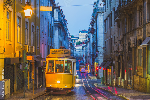tram on line 28 in lisbon, portugal at night