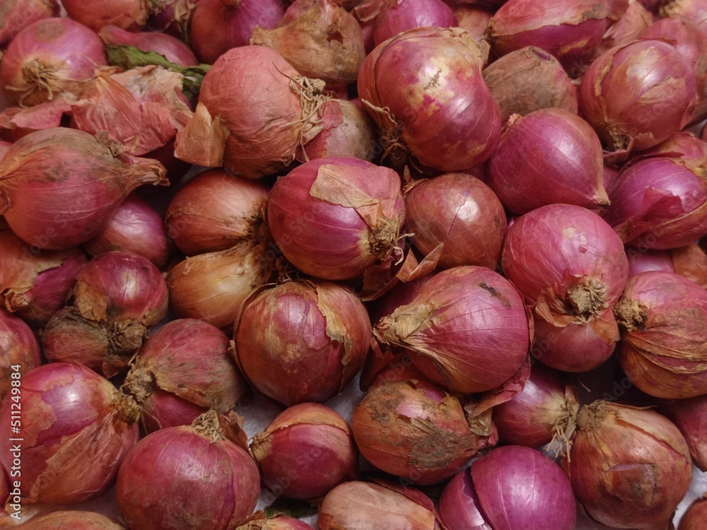 red onions on market, red onions arranged on a white background red onions on market, red onions arranged on a white background