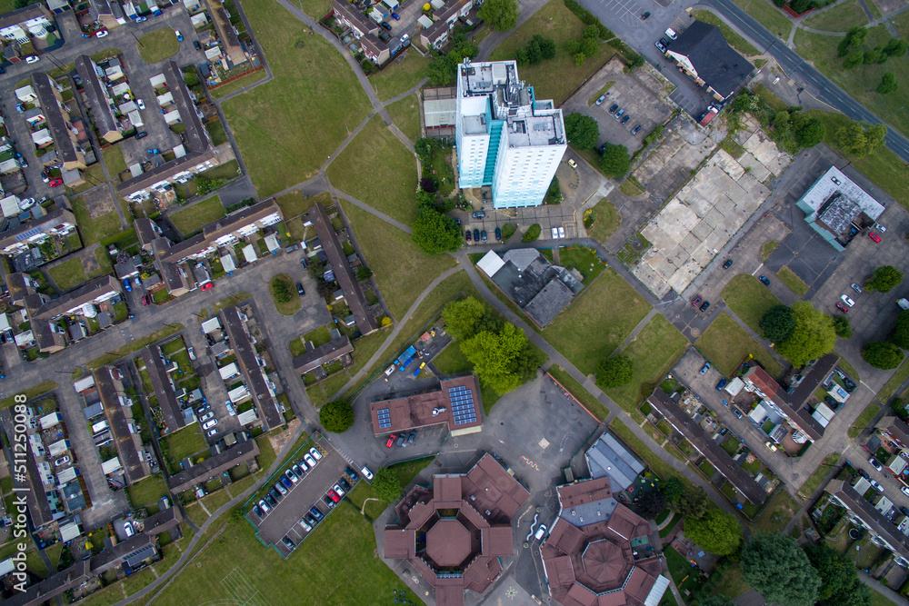 Arial view of suburban residential tower block with flammable cladding