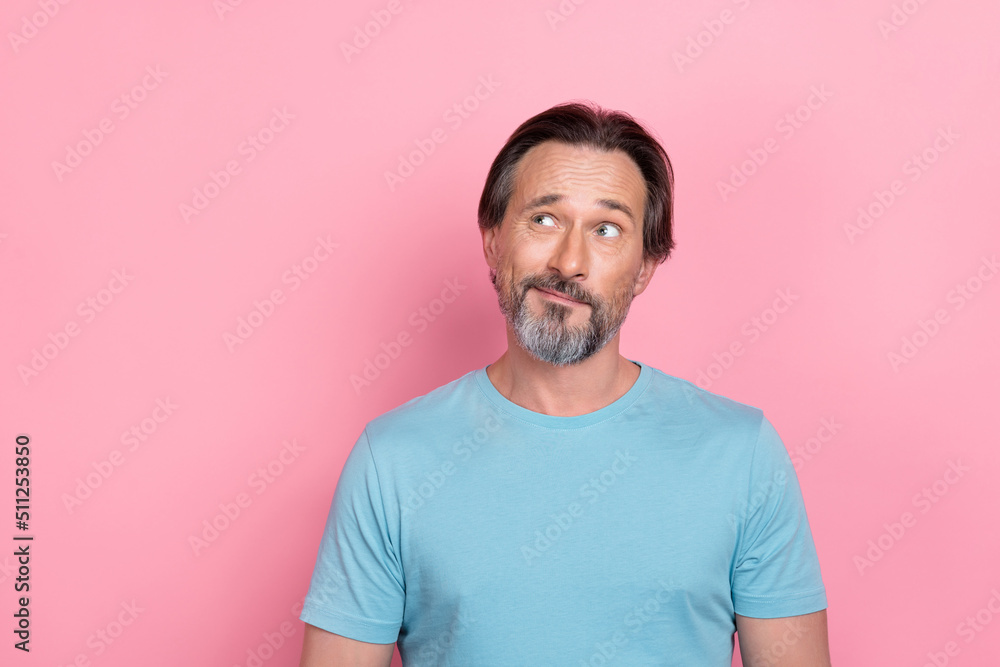 Portrait of minded person look interested empty space make decision isolated on pink color background Portrait of minded person look interested empty space make decision isolated on pink color background