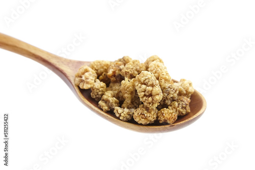 Mulberry dry berries morus alba in wooden spoon isolated on white