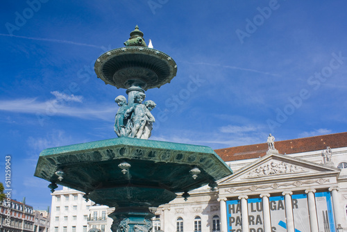 Rossio square with fountain located at Baixa district in Lisbon, Portugal