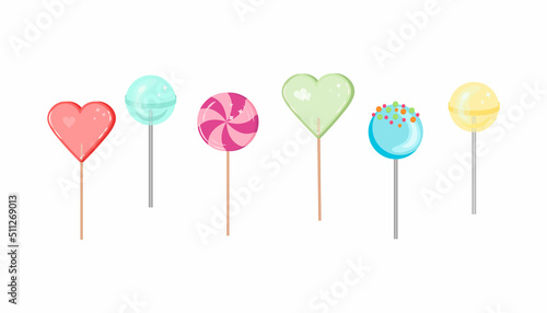 Six bright shiny sugar lollipops on a stick