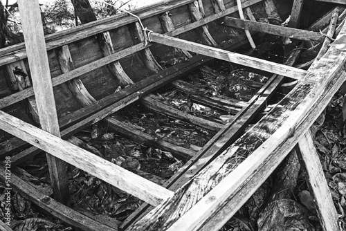 Closeup shot of old abandoned fishing boat on the shore.