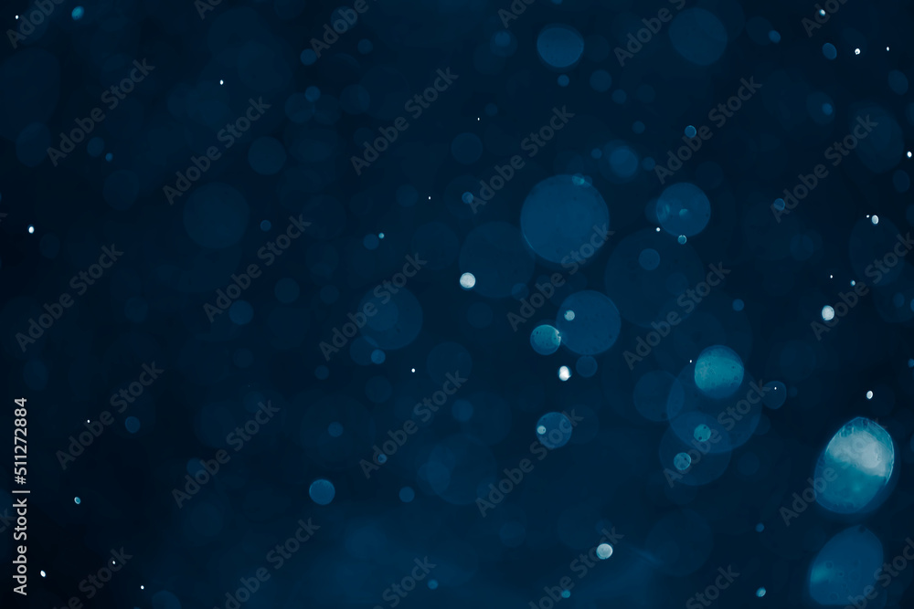 Deep blue bokeh glitter background. Christmas theme. Deep blue bokeh glitter background. Christmas theme.