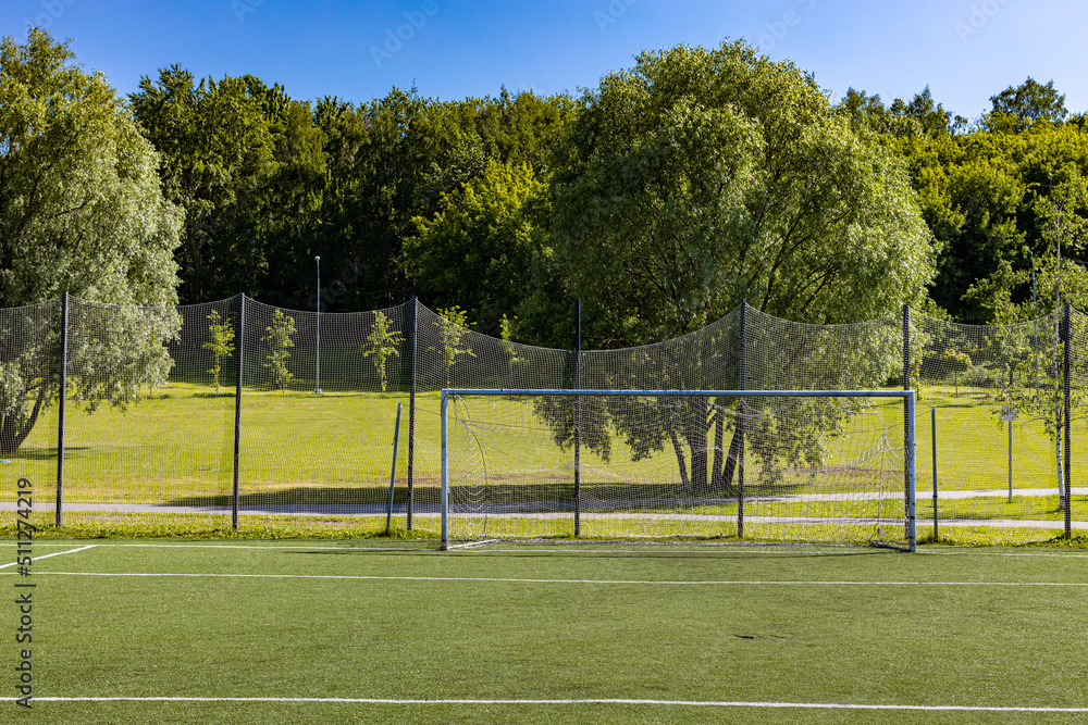 Fototapeta premium empty forts on the football field in summer