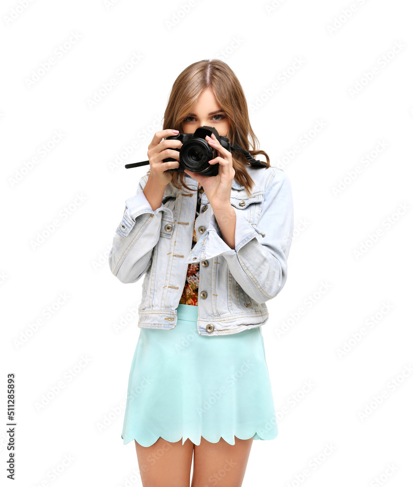 Shot of an funny young girl taking a photo with a camera Shot of an funny young girl taking a photo with a camera