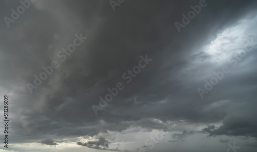 Fotografiet Dramatic dark grey clouds sky with rain