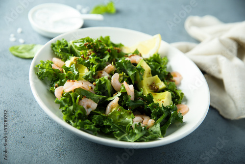 Healthy kale salad with shrimps