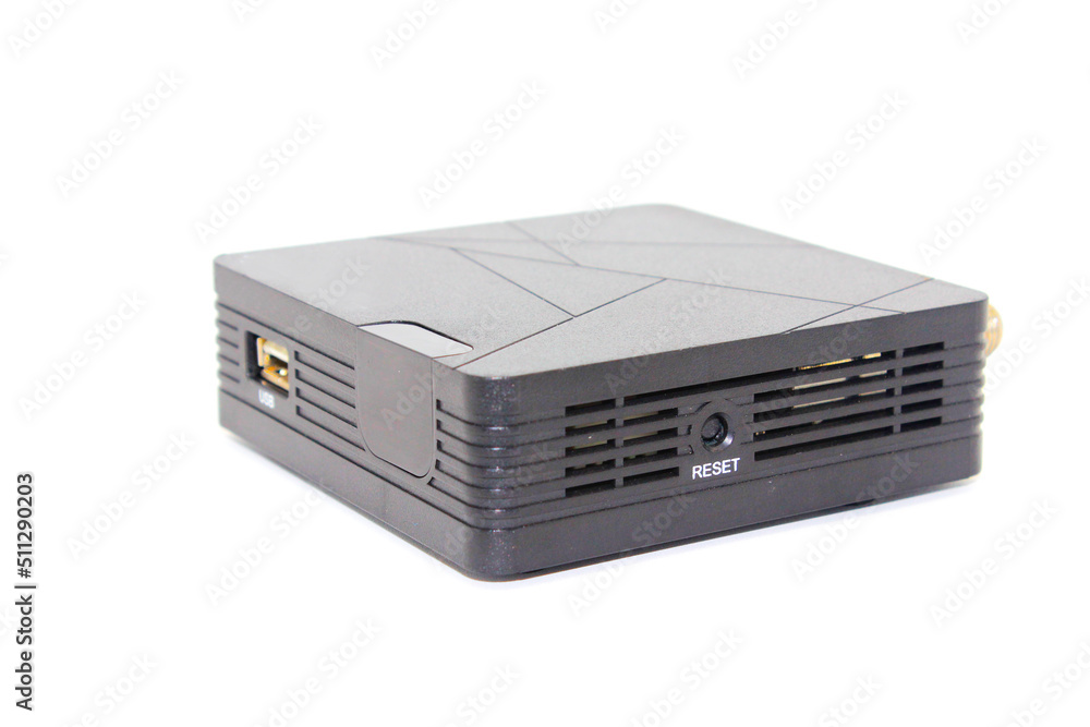 A picture of digital set up box for tv on white background with selective focusA A picture of digital set up box for tv on white background with selective focusA