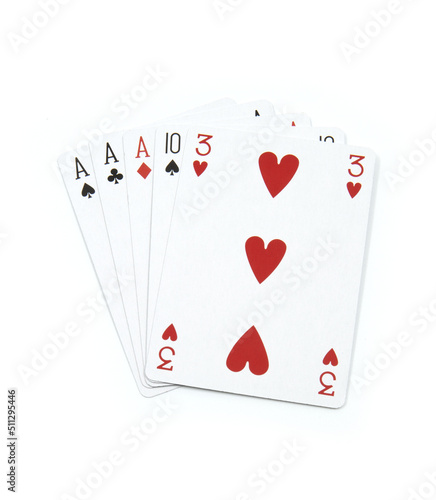 Three of a kind - poker cards on white background