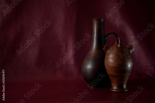  Two old clay pots jars vases for holding drink