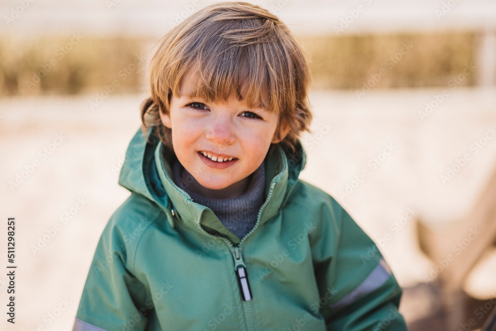 Smiling boy looking at camera Smiling boy looking at camera