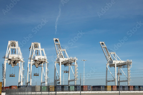 harbor cranes to carry containers at Oakland harbor, San Francisco