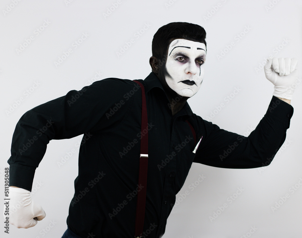 Mime looking at side while running in white background