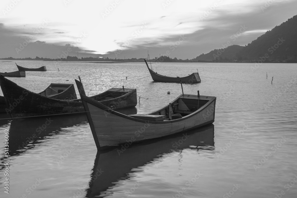 Black and white photo of boat on the beach, Aceh, Indonesia.