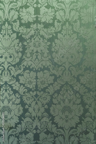 Retro floral ornamental victorian wallpaper fabric in green full frame repeating