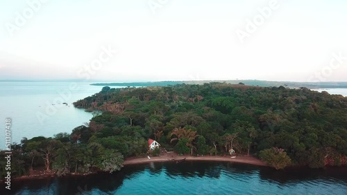 Lateral drone movement showing the resort of Banda Island (Archipelago Ssese Islands) - Victoria Lake, Uganda. photo