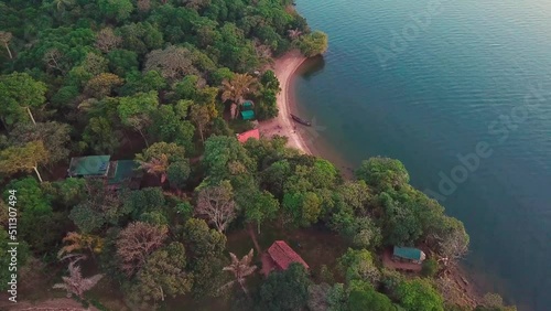 orbiting drone view of the coast of Banda Island, in the Ssese Islands archipelago, Uganda - Victoria Lake. photo