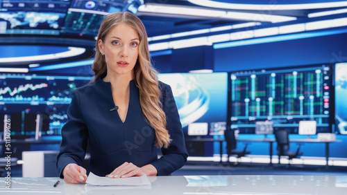 TV Live News Program: Professional Female Presenter Reporting on Current Events. Television Cable Channel Anchorwoman Talks Confidently. Mock-up Network Broadcasting in Newsroom Studio. photo