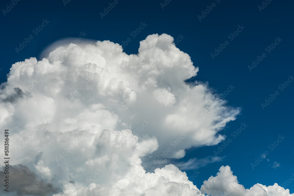 Closeup cumulus clouds with blue sky on high attitude Closeup cumulus clouds with blue sky on high attitude