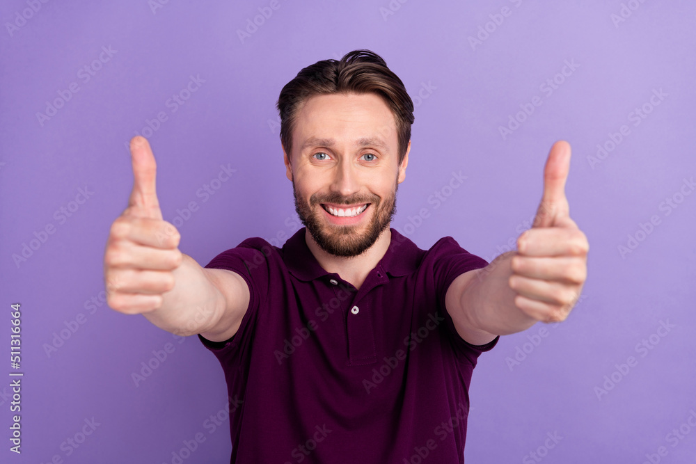 Photo of young cheerful guy show thumbs-up good perfect ideal select suggest rate isolated over violet color background Photo of young cheerful guy show thumbs-up good perfect ideal select suggest rate isolated over violet color background