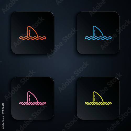 Color neon line Shark fin in ocean wave icon isolated on black background. Set icons in square buttons. Vector