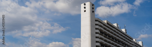 Building with white facade and sky at background in Wroclaw, banner