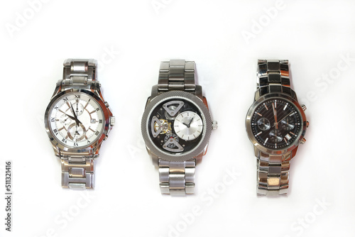 wrist watches with steel bands isolated on white background