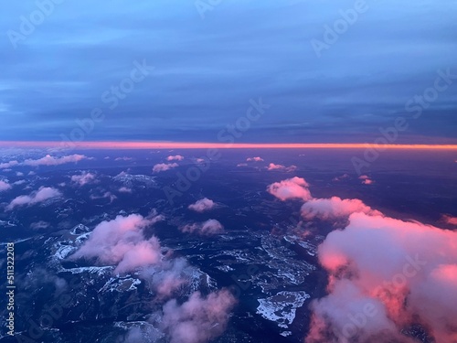 Purple pink sky from an airplane window