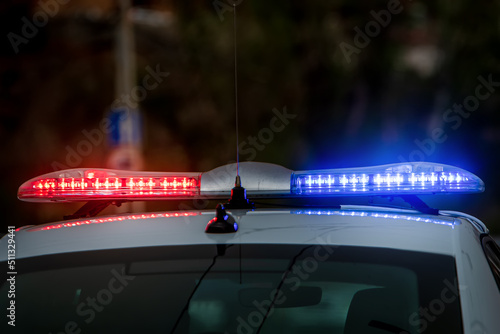 Foto Police car lights on blurred background