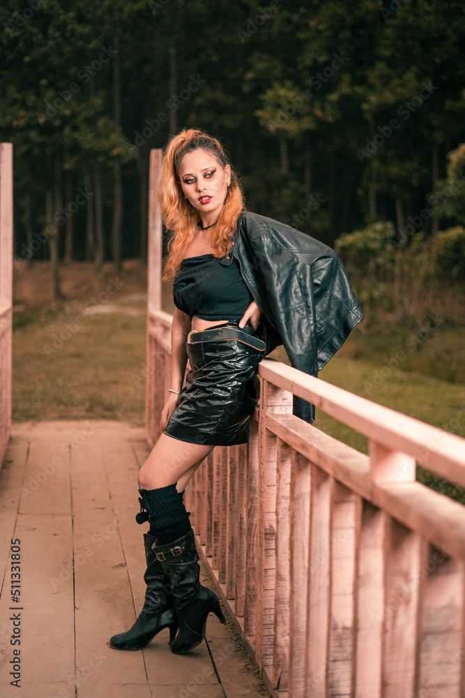 Portrait of Beautiful Model outdoor. close up portrait of young model standing in wooden Bridge. Portrait of Beautiful Model outdoor. close up portrait of young model standing in wooden Bridge.