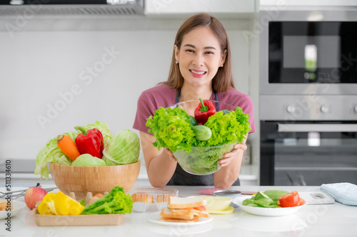 Healthy women cooking salad vegetable eat breakfast
