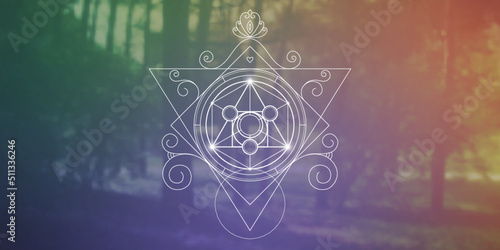 Philosopher Stone Sacred Geometry zentangle inspired design template with oriental tribal ornaments. Ornamental new age art.Meditation symbol in front of blurry nature background.