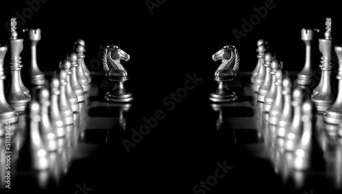 Pieces on chess board for playing game and strategy photo