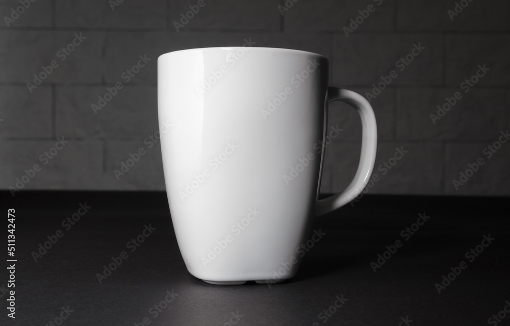 Obraz premium White ceramic coffee cup or tea mug.