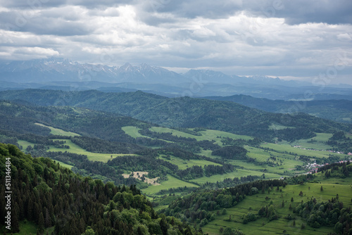 Fototapeta Naklejka Na Ścianę i Meble -  Panoramic view on Pieniny Mountains range and High Tatras from Palenica in Szczawnica, Poland